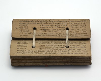 Lot 186 - Tribal, a 19th century palm leaf religious or...