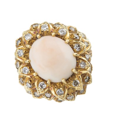Lot 198 - An 18ct gold pink coral and diamond bombe ring