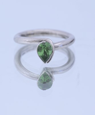 Lot 60 - An 18ct gold pear-shape emerald single-stone ring