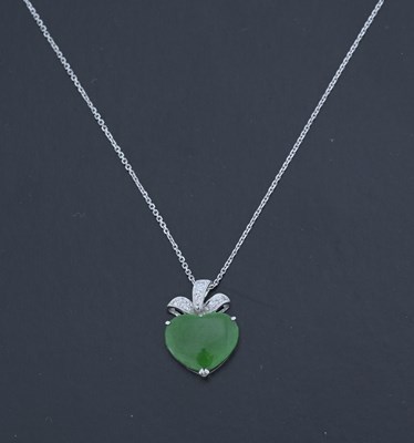 Lot 44 - An 18ct gold jade and brilliant-cut diamond pendant, with chain