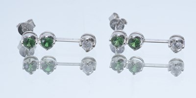 Lot 33 - A pair of 18ct gold emerald and brilliant-cut diamond drop earrings