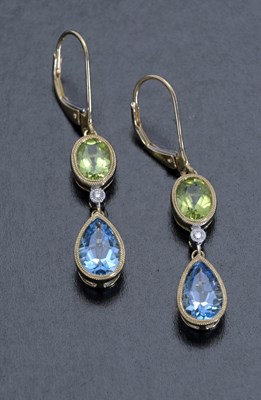 Lot 24 - A pair of 14ct gold peridot, blue topaz and diamond drop earrings