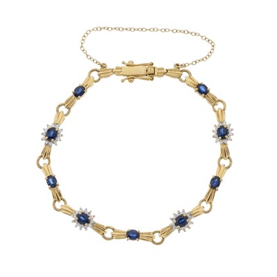 Lot 148 - An 18ct gold sapphire and diamond cluster bracelet