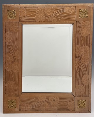 Lot 146 - An Art Nouveau carved wood mirror frame,...