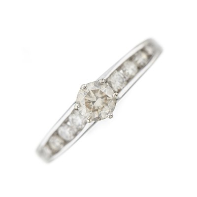 Lot 210 - An 18ct gold diamond single-stone ring