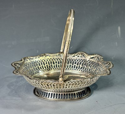 Lot 292 - A George III silver neoclassical swing handle...