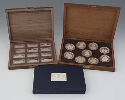 Lot 274 - Three cased commemorative silver ingot sets,...