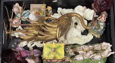 Lot 34 - A collection of ceramic and resin figurines...