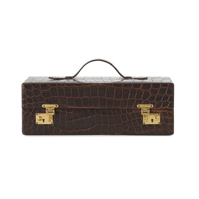 Lot 518 - A crocodile leather jewellery box.