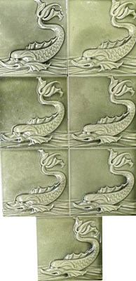 Lot 205 - Maw and Co., seven relief moulded dolphin...