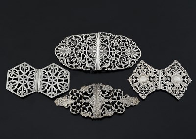 Lot 338 - Four hallmarked silver buckles, late...