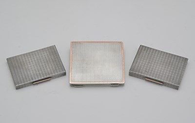 Lot 180 - Three George VI silver cigarette boxes, to...