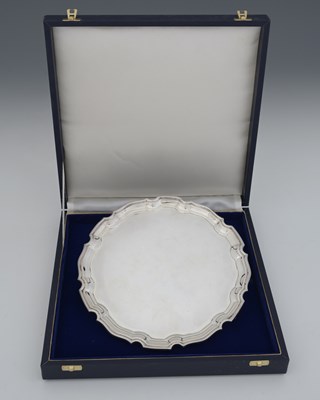 Lot 177 - An Elizabeth II silver salver, modelled in the...