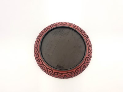 Lot 624 - A Cinnabar carved lacquer circular charger,...