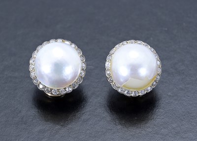Lot 42 - A pair of mid 20th century mabe pearl and diamond cluster earrings