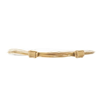 Lot 145 - A high carat gold multi-row wire bangle bracelet