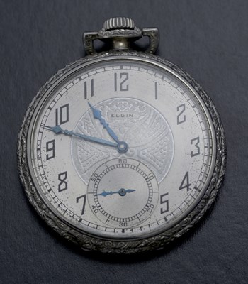 Lot 101 - An Art Deco Elgin pocket watch, engine turned...