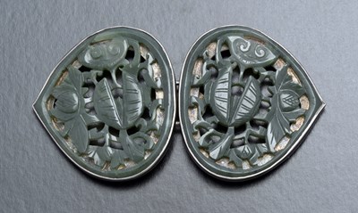 Lot 2 - A Chinese carved jade and white metal mounted...