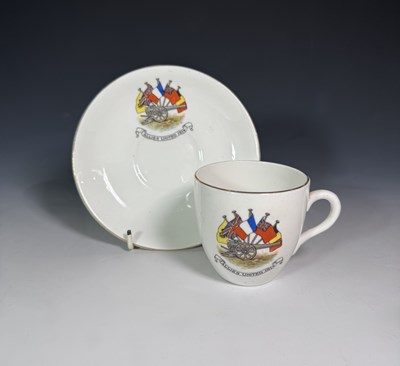 Lot 85 - A WWI commemorative porcelain teacup and...