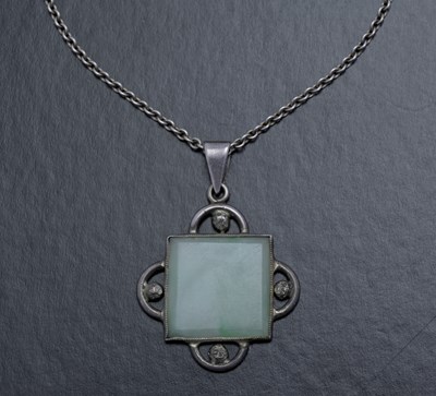 Lot 86 - An Art Deco jade and silver pendant on chain,...