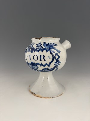 Lot 734 - An English Delft blue and white dry drug jar,...