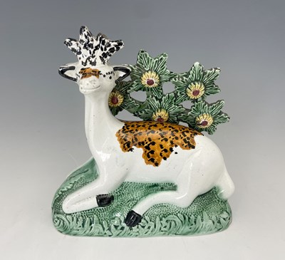 Lot 732 - A pearlware model of a stag, circa 1790,...