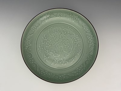 Lot 360 - A Chinese celadon dish, Yongzheng mark, slip...