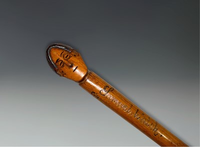 Lot 64 - A vernacular carved walking stick, likely 19th...