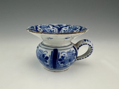 Lot 629 - An early to mid 18th century Delft blue and...