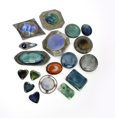 Lot 273 - A Ruskin Pottery brooch, circular, souffle...