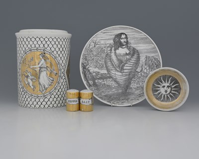 Lot 654 - A Fornasetti Milano porcelain cruet set,...