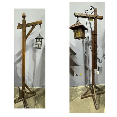 Lot 357 - Two floor standing lantern lights: one metal...