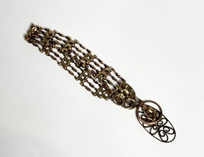 Lot 254 - A 9ct gold gate bracelet, with heart-shape clasp and two charms