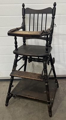 Lot 390 - An early 20th century childs wooden high chair...