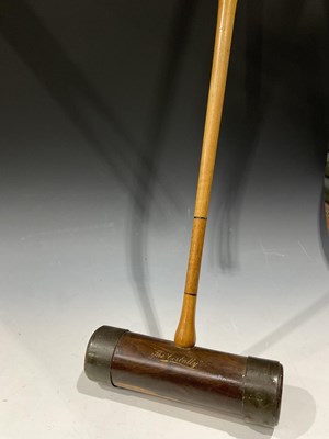 Lot 63 - An early 20th century croquet mallet 'The...