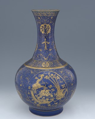 Lot 429 - A Chinese Dragon and Phoenix gilt decorated...