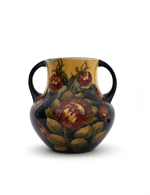 Lot 32 - 'Protea' a rare Moorcroft Pottery twin-handled...