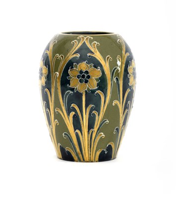 Lot 10 - 'Green and Gold Florian Ware' a small James...