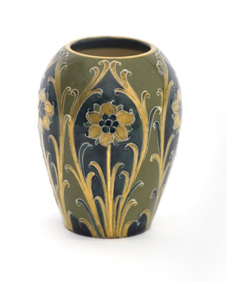 Lot 10 - 'Green and Gold Florian Ware' a small James...