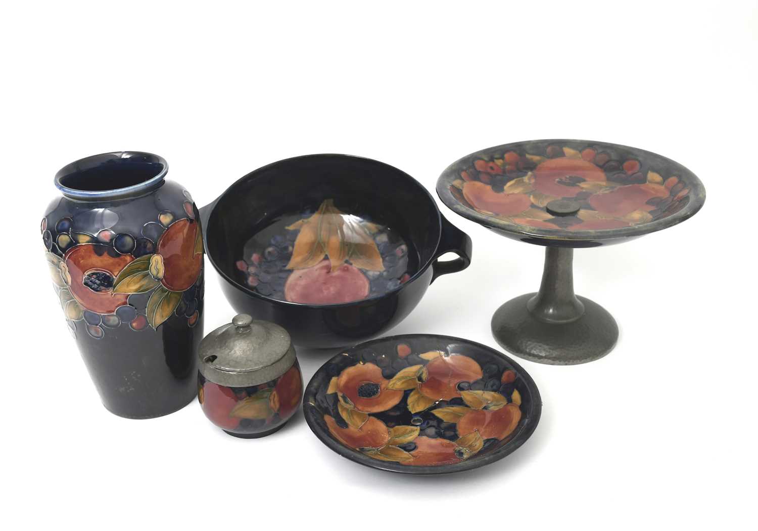 Lot 29 - 'Pomegranate' a Moorcroft Pottery vase...