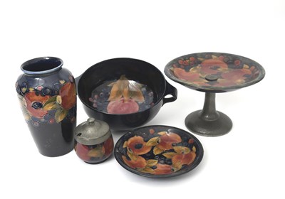Lot 29 - 'Pomegranate' a Moorcroft Pottery vase...