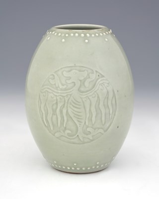 Lot 453 - A Chinese celadon barrel vase, Yongzheng mark,...