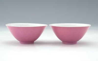 Lot 451 - Two Chinese pink monochrome bowls, marked...