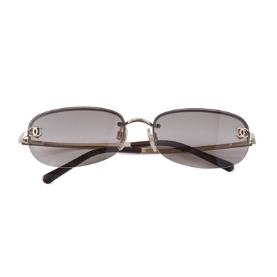 Lot 322 - Chanel, a pair of rimless CC logo sunglasses.