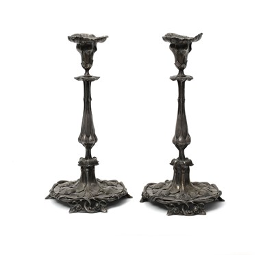 Lot 206 - A pair of silvered bronze candlesticks, each...