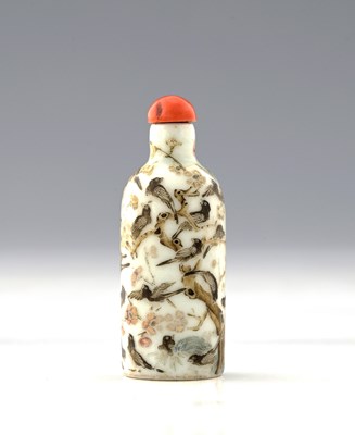 Lot 434 - A Chinese famille rose snuff bottle, magpie...