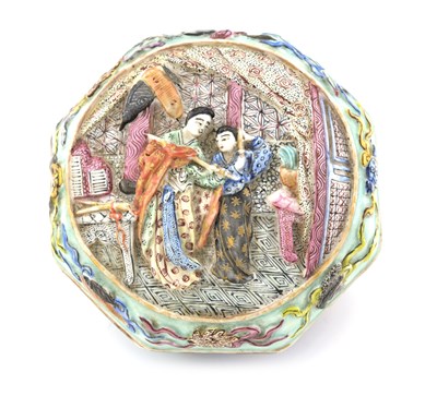 Lot 450 - A Chinese famille rose relief moulded...