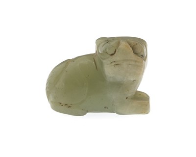 Lot 421 - A Chinese carved jade pendant, in the form of...