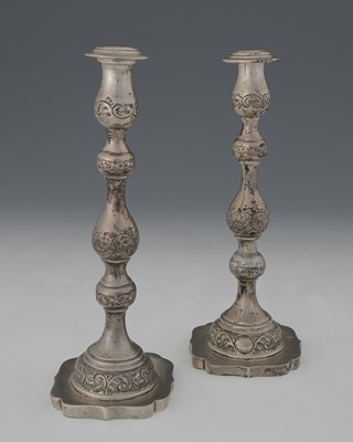 Lot 122 - A pair of George V silver Shabbat candlesticks,...