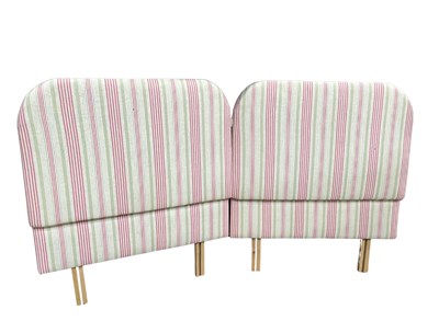 Lot 394 - A pair of padded single bed heads, upholstered...